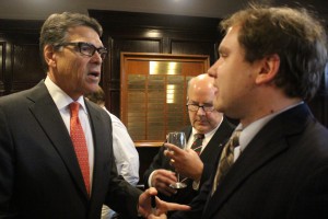 Former Texas Gov. Rick Perry speaking with RespectAbility Fellow James Trout at the National Press Club in Washington, D.C. on July 2, 2015.