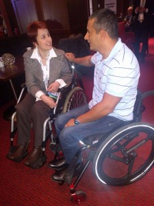 Stel Penhasov and Dror Cohen talking in their wheelchairs