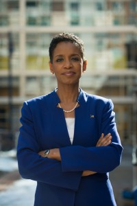 IMAGE Rep Donna Edwards D-MD, wearing a blue suit, stands before a blurry background.