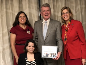 Idaho Governor Butch Otter holding an award from RespectAbility, with Jennifer Mizrahi and two other people next to him