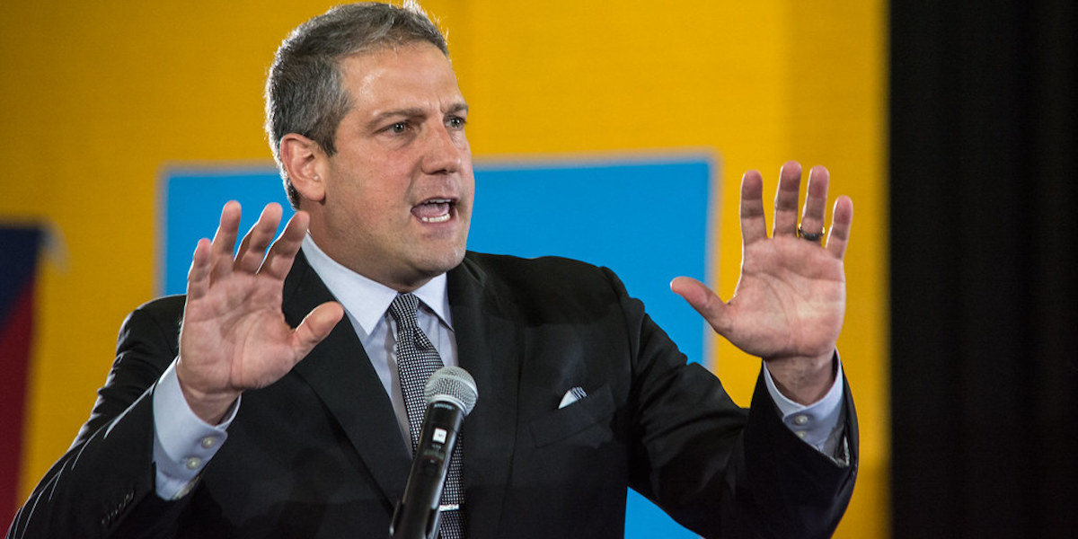 Rep. Tim Ryan giving a speech with his hands up